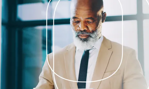 man looking at tablet