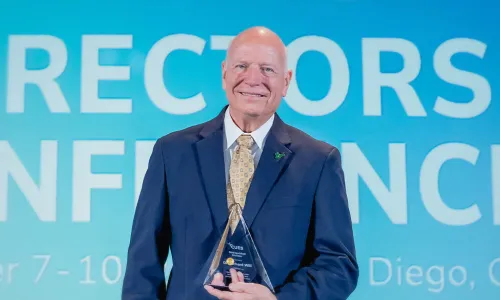 Dr. Rick Will with his 2025 CUES Distinguished Directors Award at CUES Director Conference